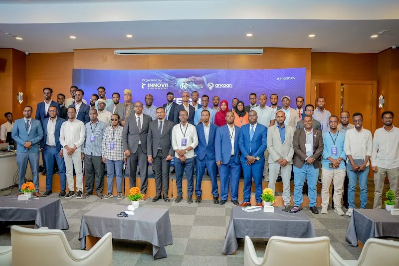 Corporate group photo at a technology forum