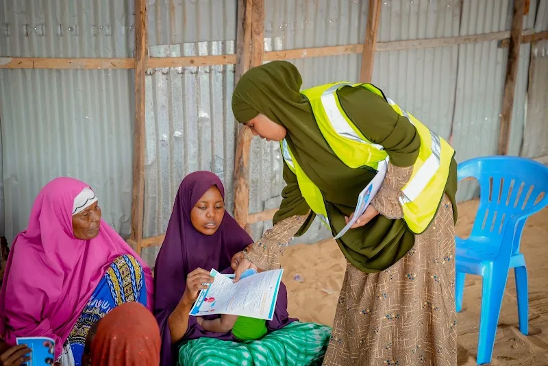 Hilaac field team documenting an awareness campaign